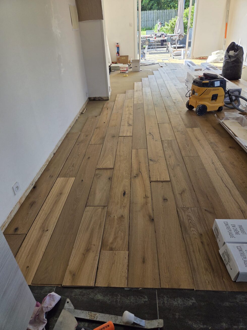 photo d'une pose parquet collé et contrecollé